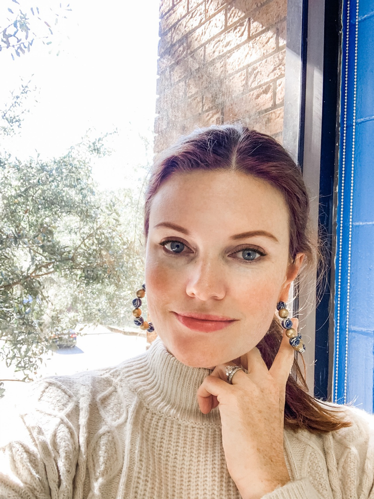 red headed women in chinoiserie earrings